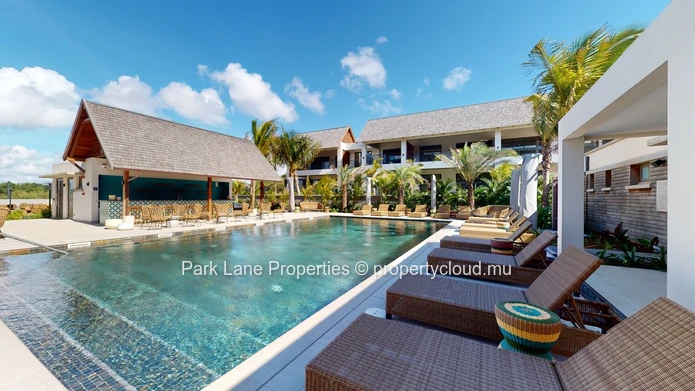 2-Bedroom Ground-Floor Apartment – Refined Island Living with Private Garden and Pool