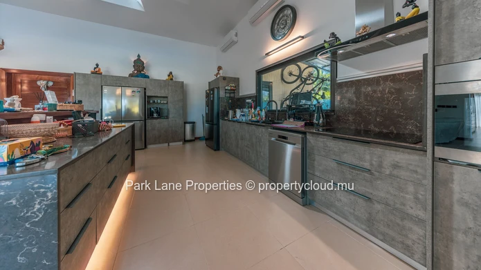 Charming Family Home at the Foot of the Mountain with Lush Tropical Garden and Spectacular Views