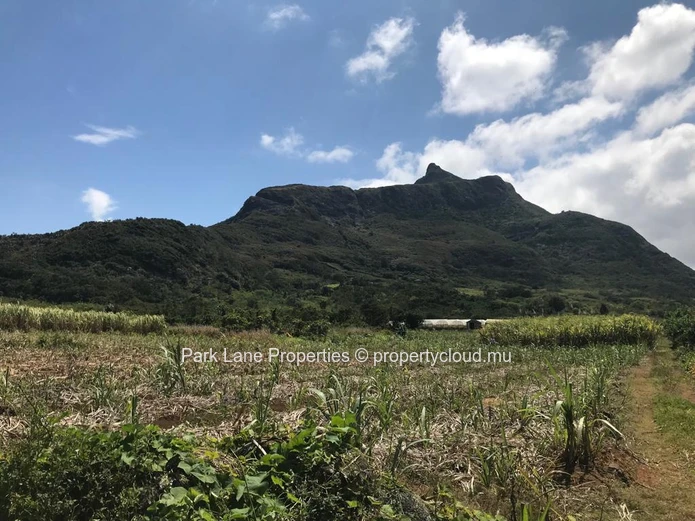 Vast plot of agricultural land with splendid views over mountain in St Pierre, Moka.