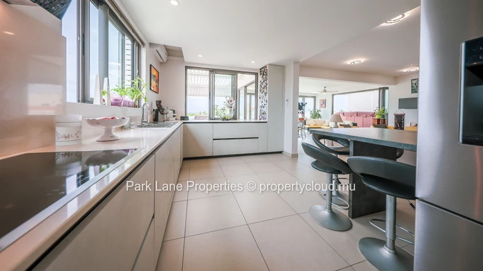 Exceptional Beachside Penthouse Steps from the Beach