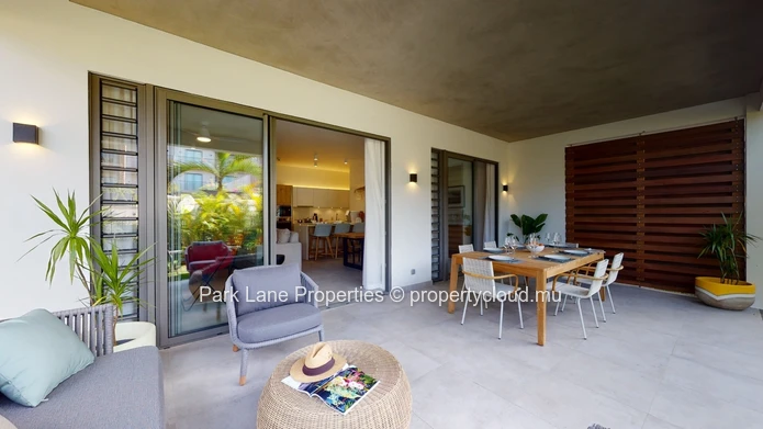 2-Bedroom Ground-Floor Apartment – Refined Island Living with Private Garden and Pool