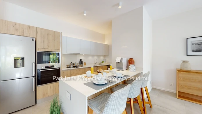 2-Bedroom Ground-Floor Apartment – Refined Island Living with Private Garden and Pool
