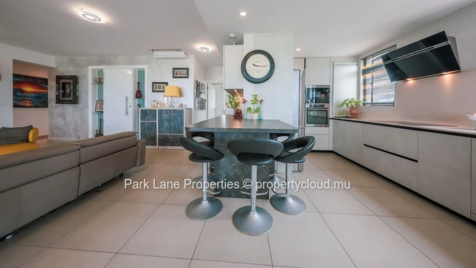 Exceptional Beachside Penthouse Steps from the Beach