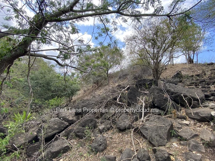 Serene Plot in Private Tamarin Estate with River Feature and Mountain Backdrop