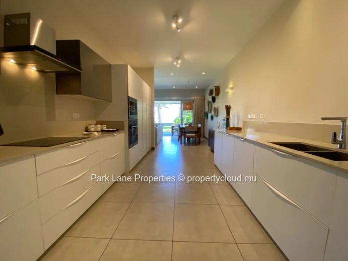 Exclusive 3-Bedroom Apartment with Private Garden & Pool Near the Beach