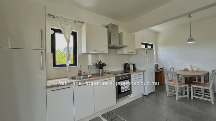 Turnkey Guesthouse Investment with 3 Apartments, Pool & High Rental Yield