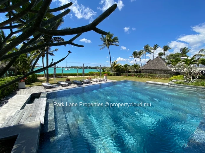 Exclusive 3-Bedroom Apartment with Private Garden & Pool Near the Beach