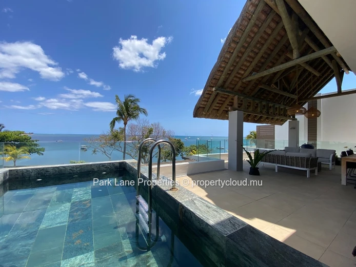 Exquisite beachfront penthouse on the water