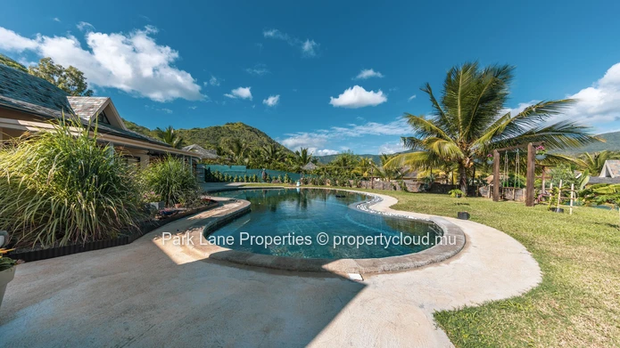 Charming Family Home at the Foot of the Mountain with Lush Tropical Garden and Spectacular Views