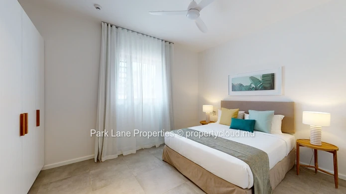 2-Bedroom Ground-Floor Apartment – Refined Island Living with Private Garden and Pool