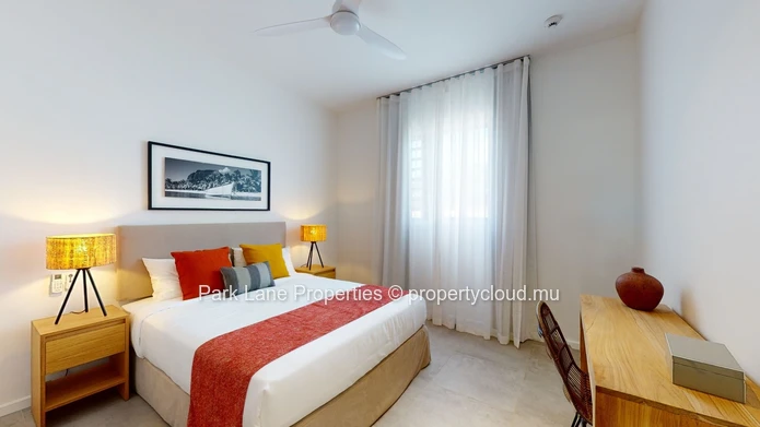 2-Bedroom Ground-Floor Apartment – Refined Island Living with Private Garden and Pool